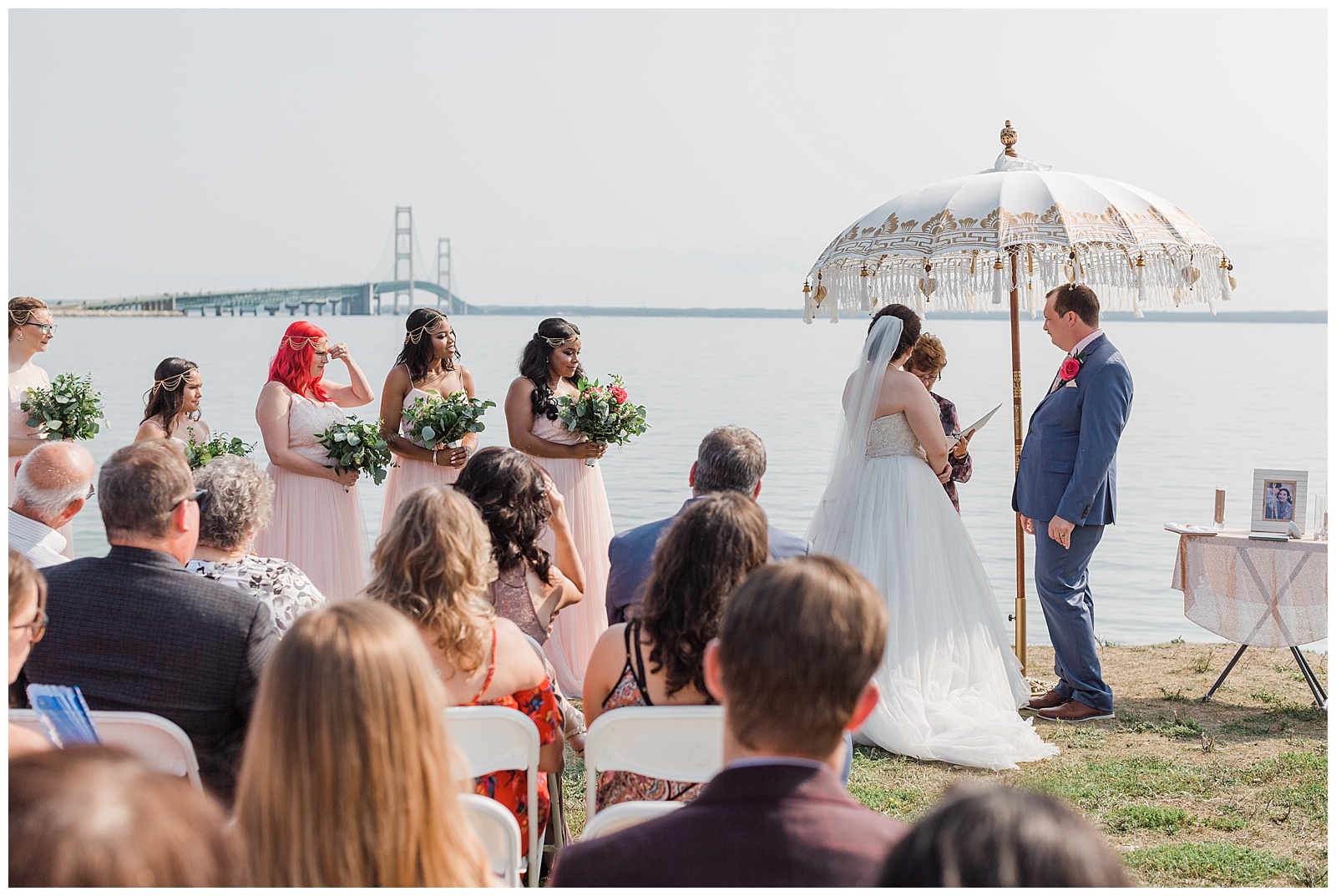 Bridesmaids watch during Mackinac wedding ceremony in St. Ignace, Michigan.