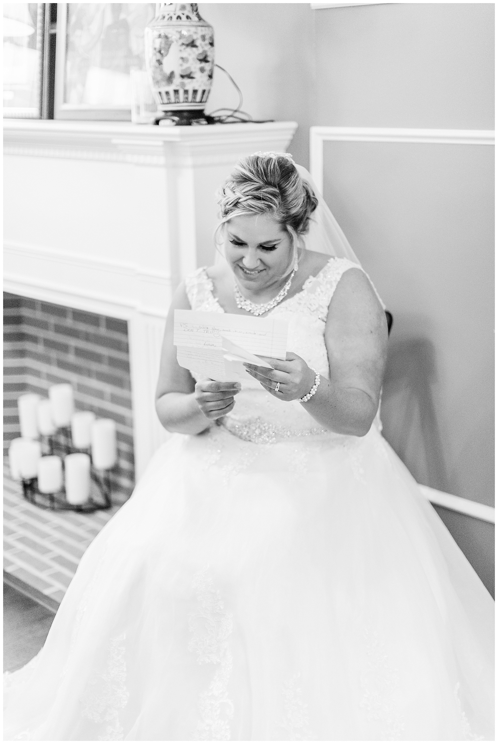 Bride reads letter from her groom before their Fairlane Club Fall Wedding ceremony.