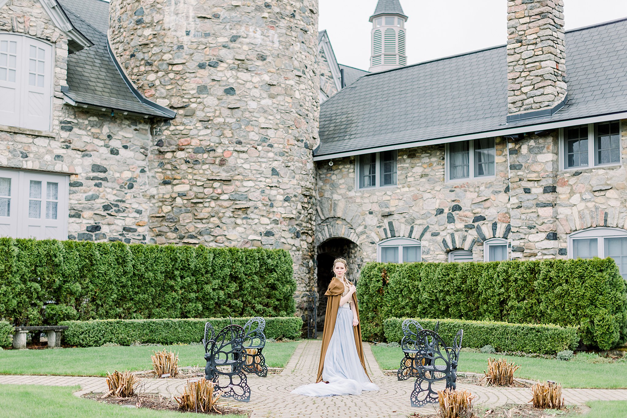 Bride poses for Game of Thrones wedding in Butterfly Garden at Castle Farms in Charlevoix, Michigan.