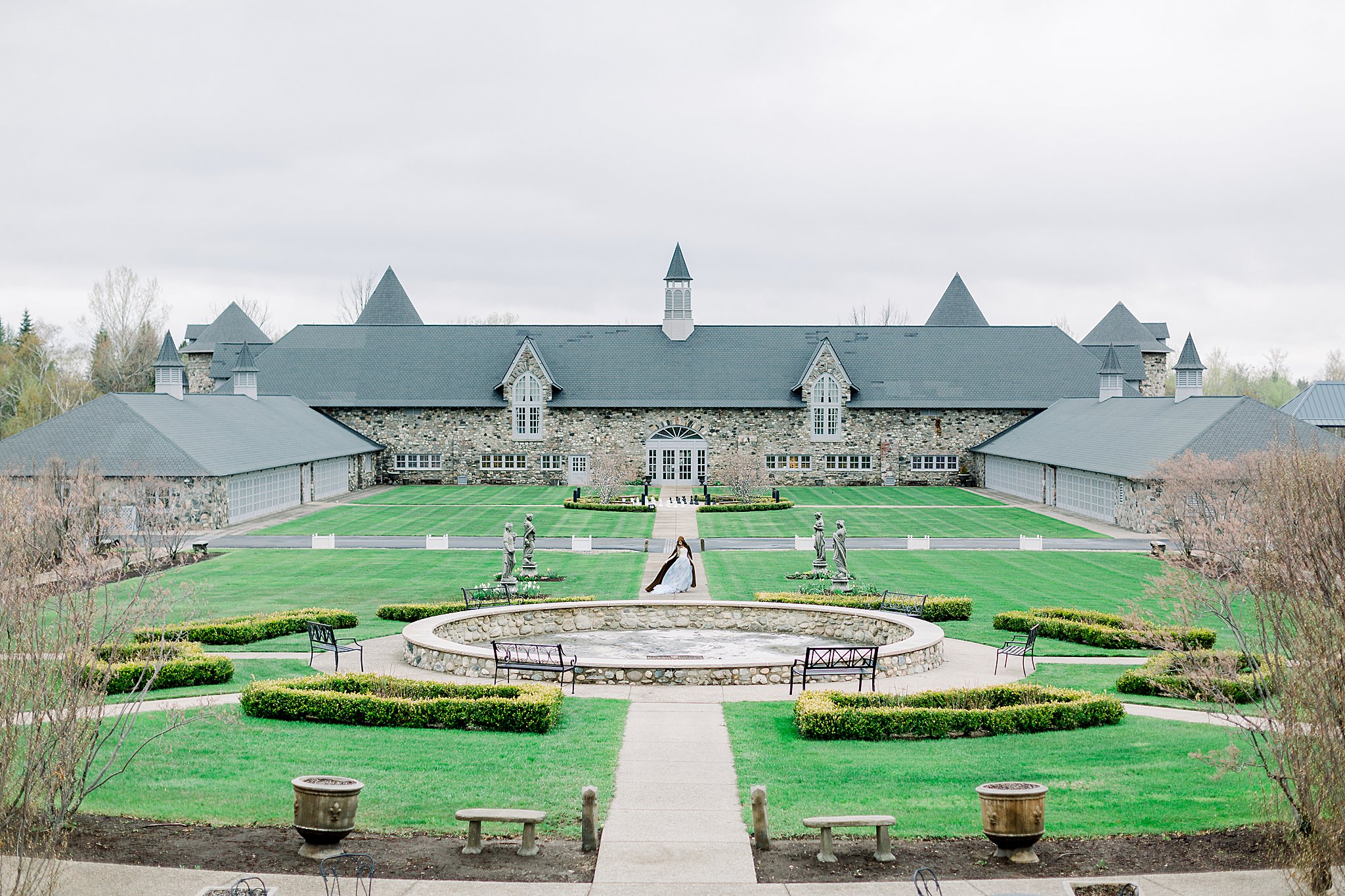 Bride wanders through Castle grounds for Game of Thrones wedding at Castle Farms in Charlevoix, Michigan.