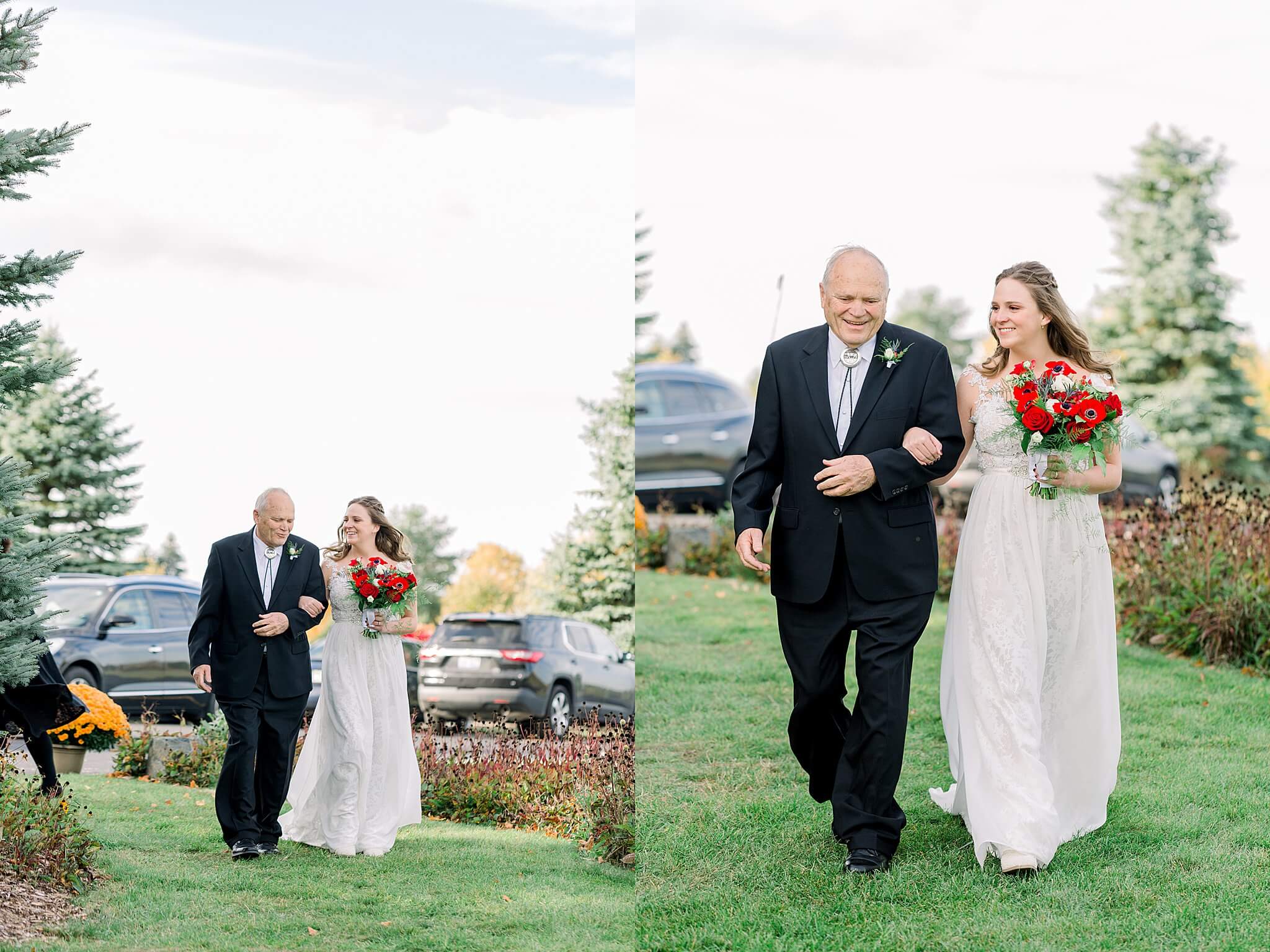 Bride smiles at dad while walking down the aisle during Timberlee Hills Wedding in Traverse City, Northern Michigan.