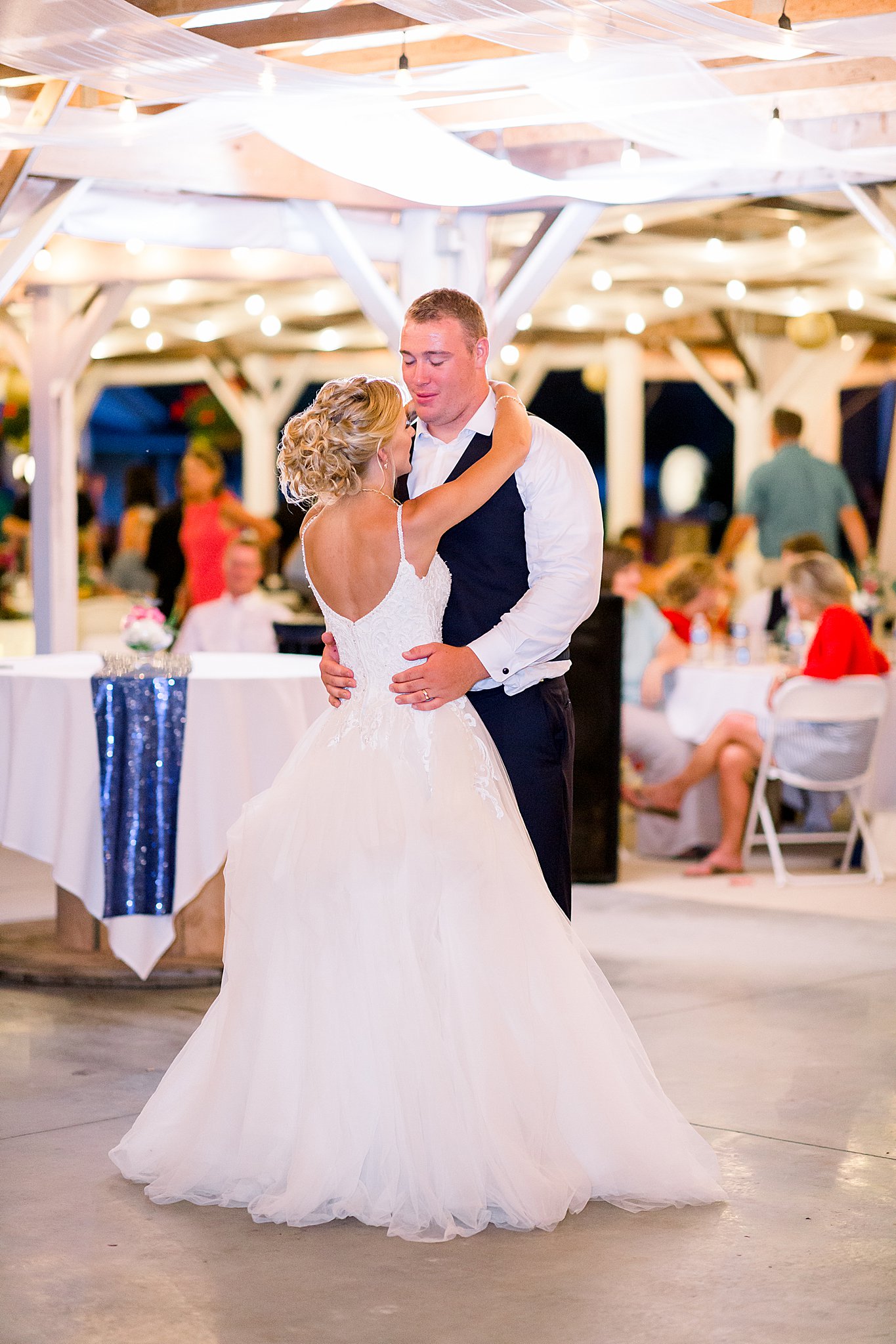 Bride and groom dance together for the first time during Post Family Farm Wedding