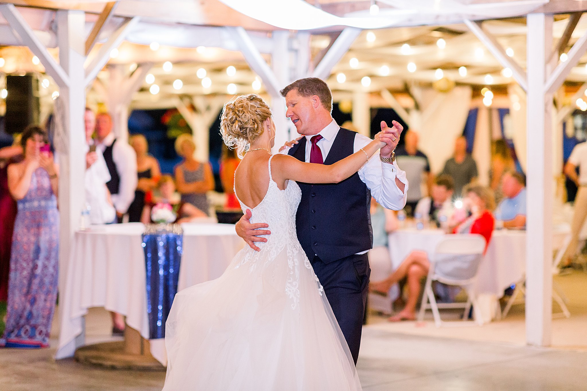 Father of the Bride dances with Bride during Post Family Farm Wedding
