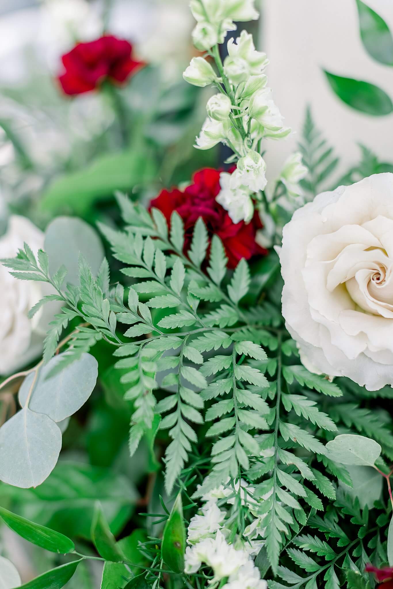 Ceremony florals during Michigan Summer Backyard Wedding