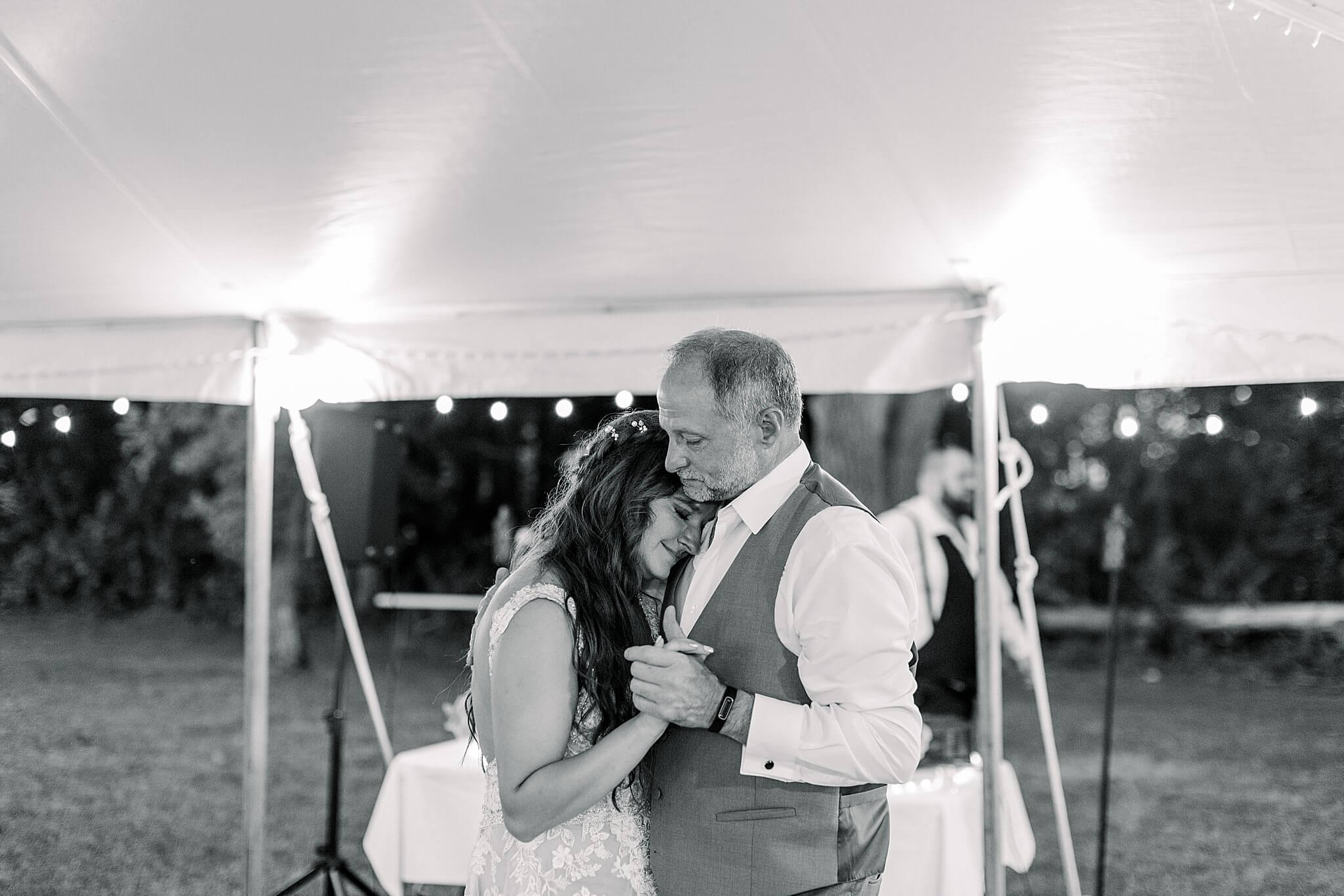 Bride and dad cry during Father/Daughter dance during Michigan Summer Backyard Wedding