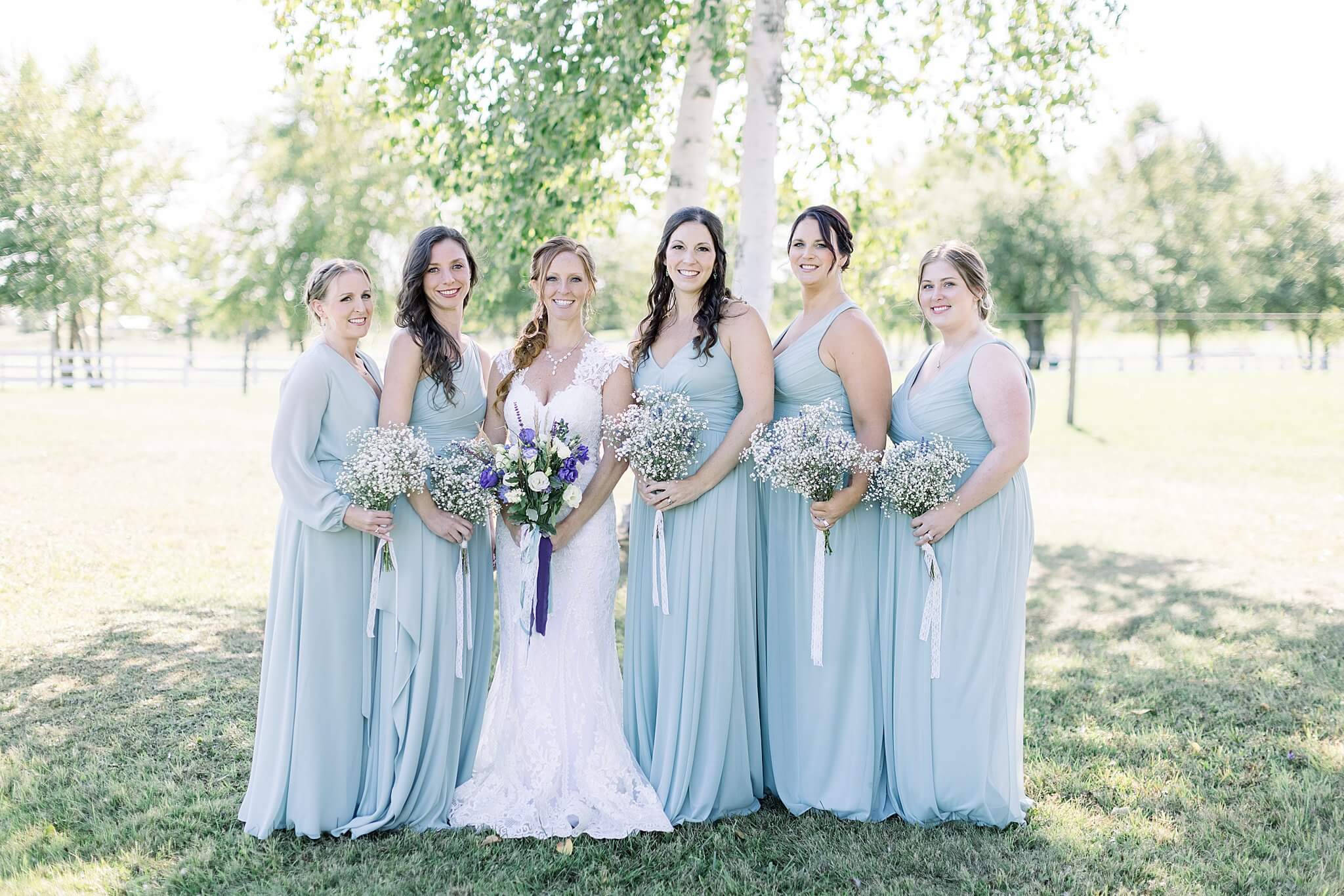 Portrait of the bride and bridesmaids during Crooked Creek Ranch wedding.
