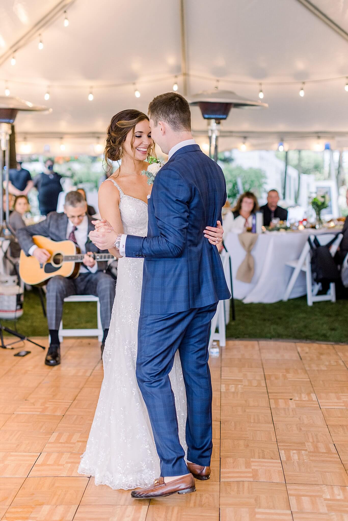 Bride and groom share first dance during Intimate Northern Michigan Wedding reception.