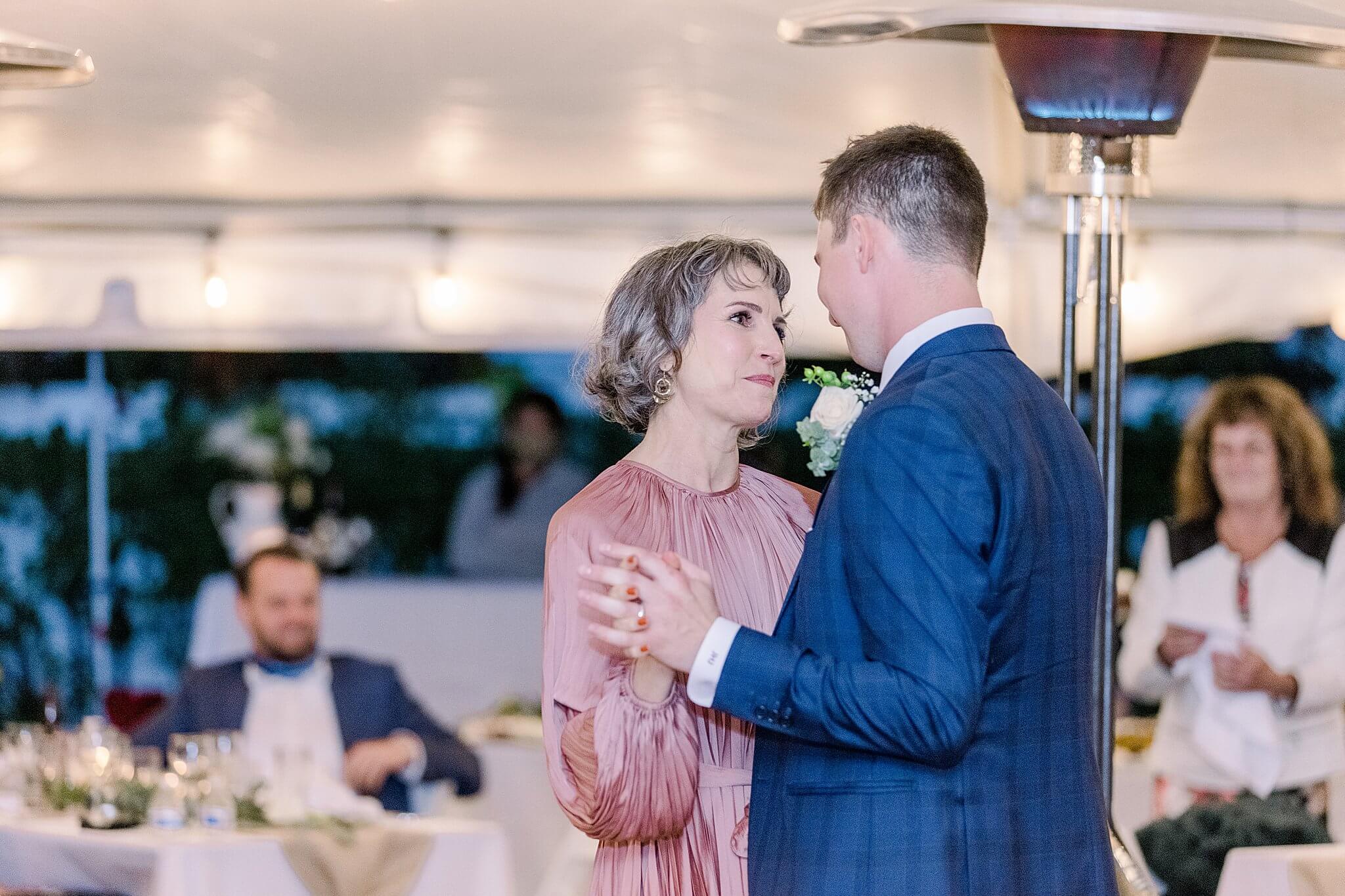 Groom dances with mom at Intimate Northern Michigan Wedding.