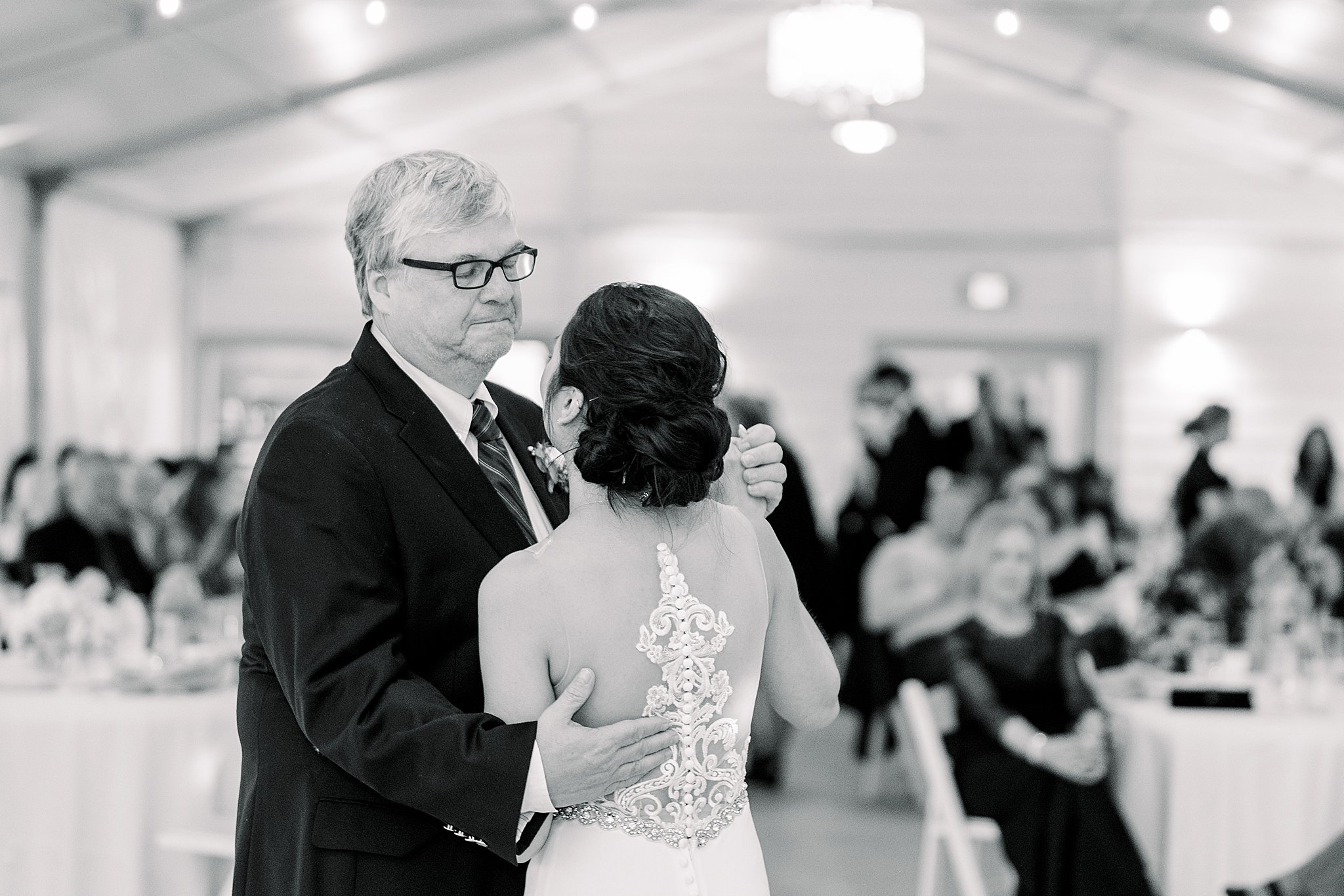 Bride and her father dancing during elegant Grand Rapids wedding day reception.