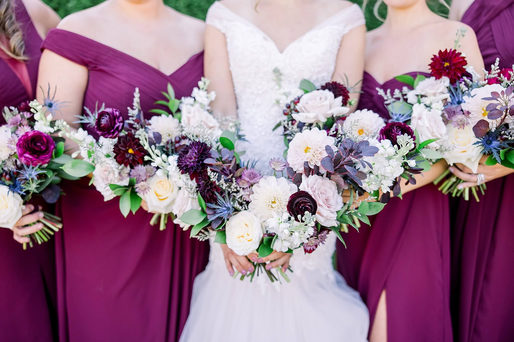 Bride and bridesmaids bouquets on display at Castle Farms wedding