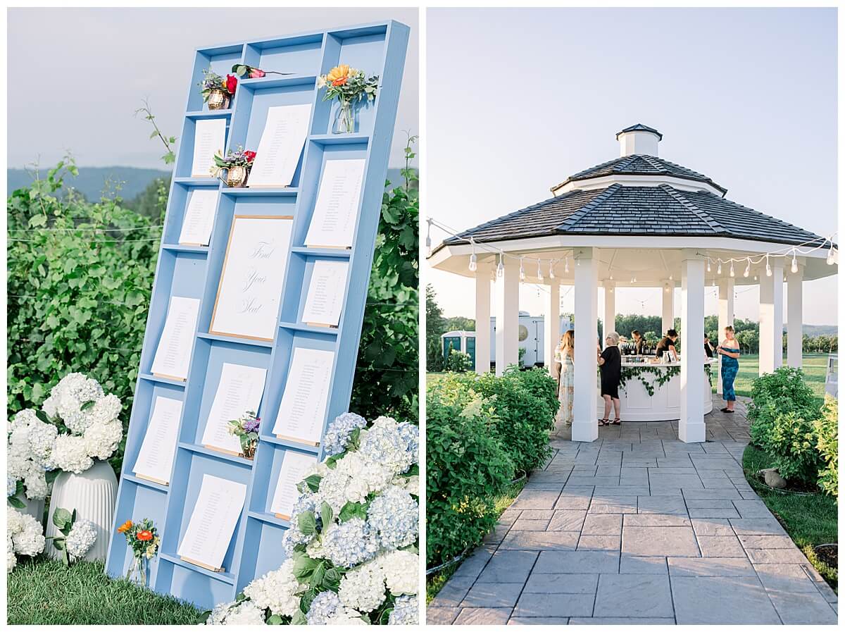 Dusty blue seating chart located among rows a vineyard overlooking the Bay in Traverse City Michigan.