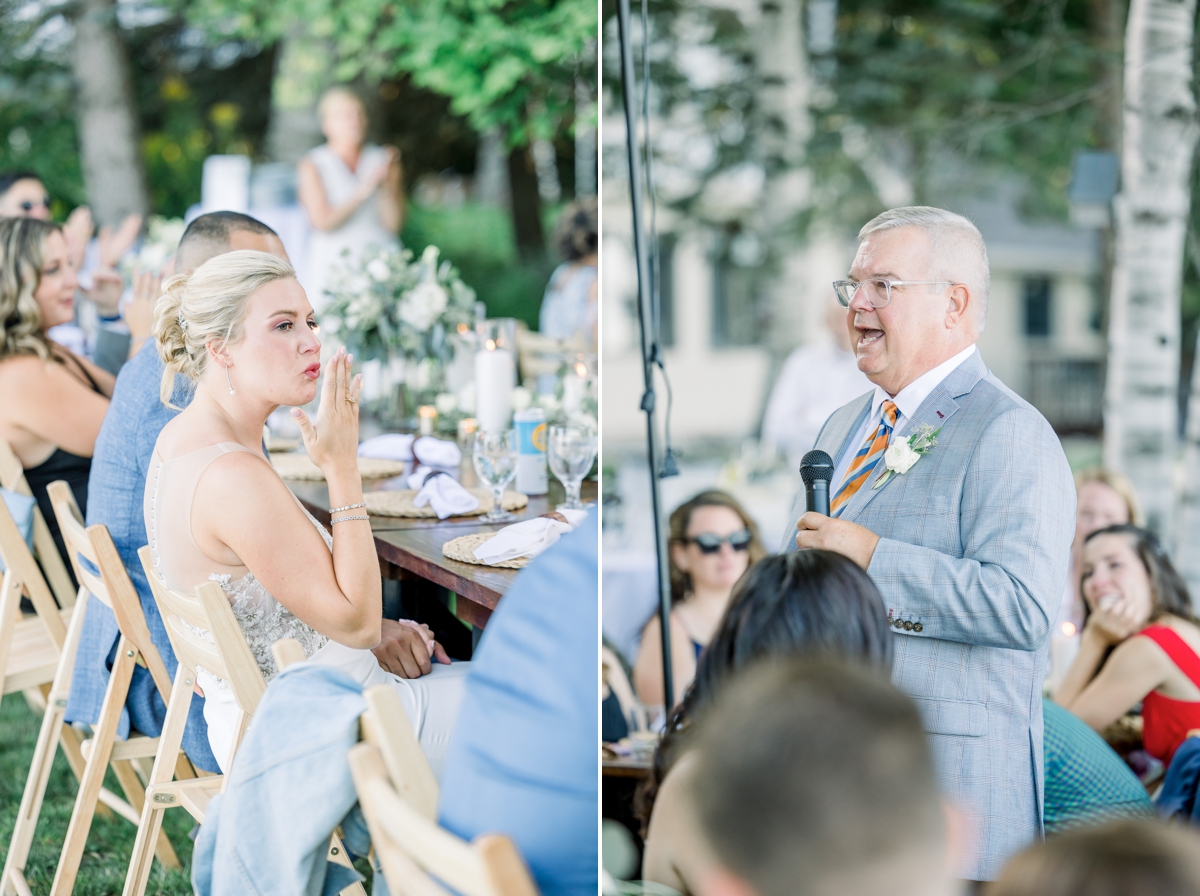 Caitlin blowing a kiss at her dad as he does his father of the bride toasts on her wedding day.